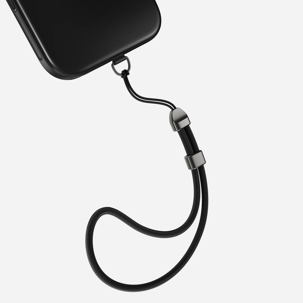 Nomad Kevlar wrist strap attached to phone case