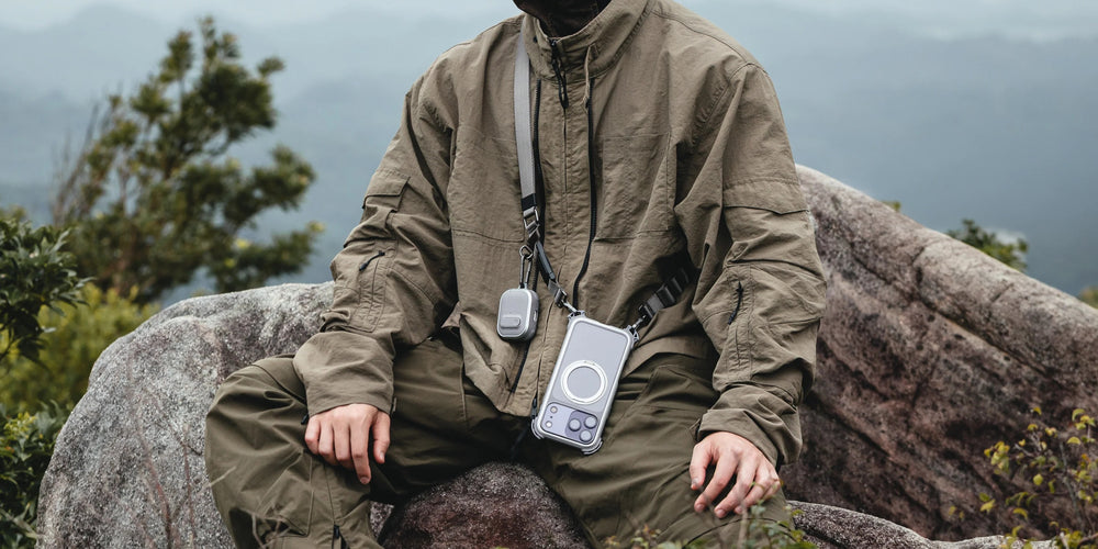 MAGEASY Odyssey rugged AirPods Pro 3 case worn with a crossbody gear setup outdoors