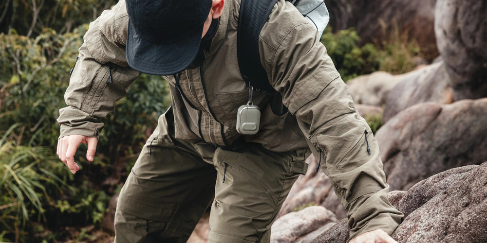 MAGEASY Odyssey rugged AirPods Pro 3 case worn on a chest strap during hiking