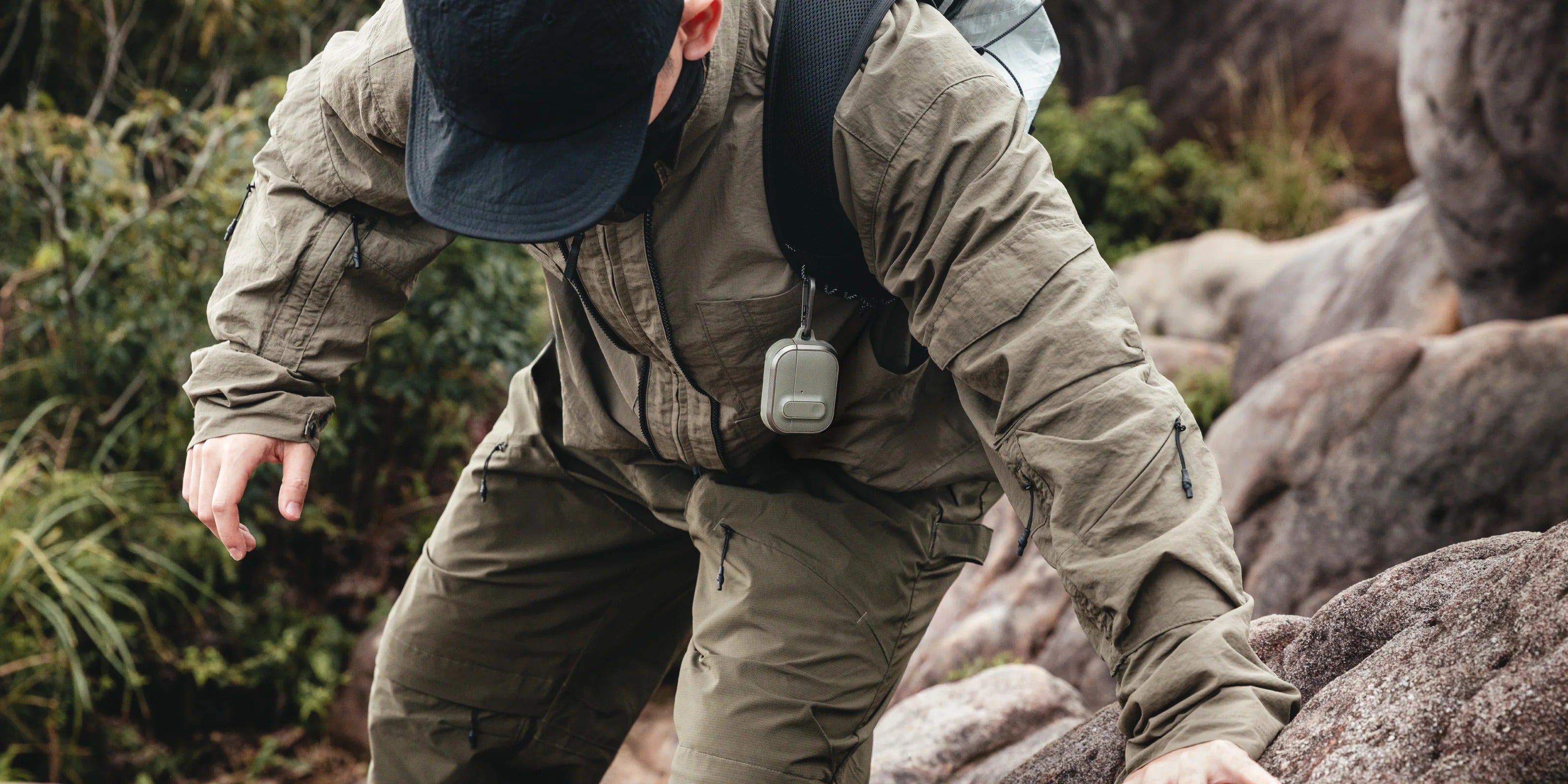 MAGEASY Odyssey outdoor AirPods Pro 3 case opened in hand to show quick access to AirPods