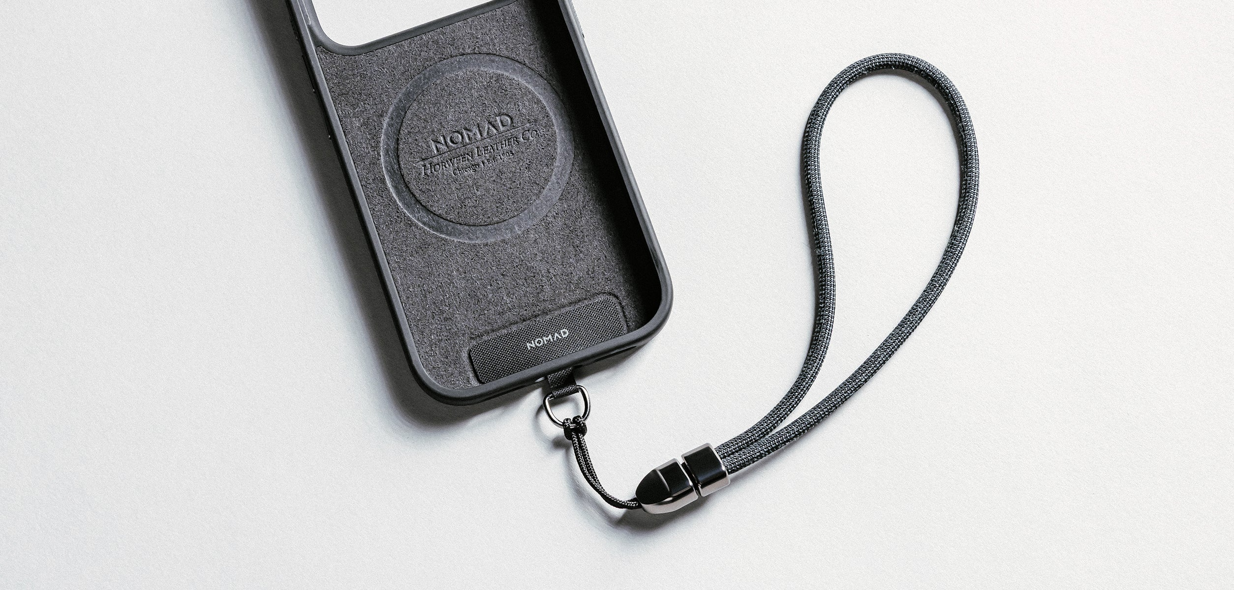 Nomad Wrist strap with nomad phone case